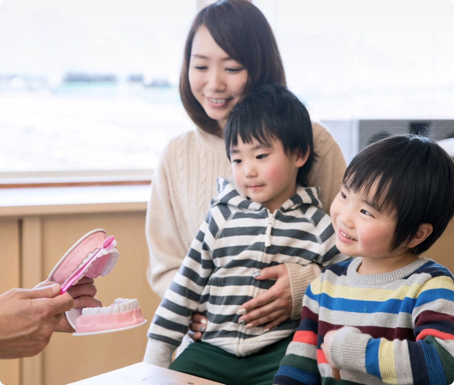 Group of patients talking to dentist