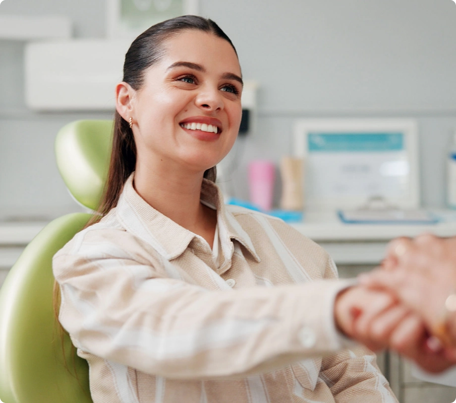 Woman dentist shaking hands